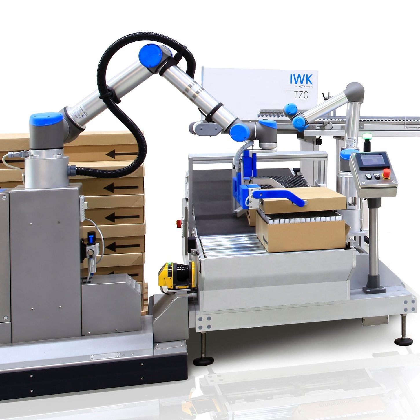 Automated robotic system lifts cartons on a conveyor belt and positions them in the line.