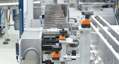 CH4 cartoner in production environment with clear lines and protective glazing.