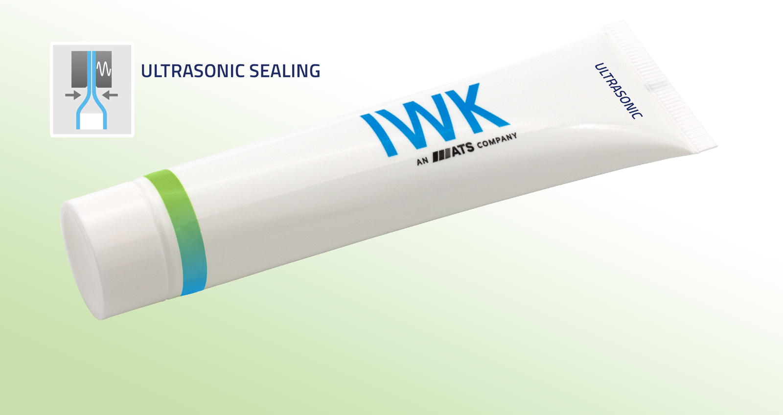 Weiße Tube mit IWK-Branding und Hinweis auf Ultraschall-Verschweißung.