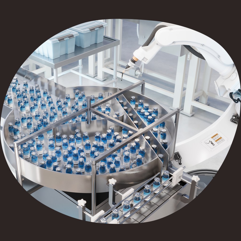 Pharma-Rondell mit zahlreichen Vials in einer automatisierten Zuführung und einem robotergestützten Handlingmodul.