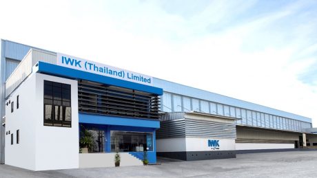 Exterior view of the IWK Thailand site with modern production hall and administration area.