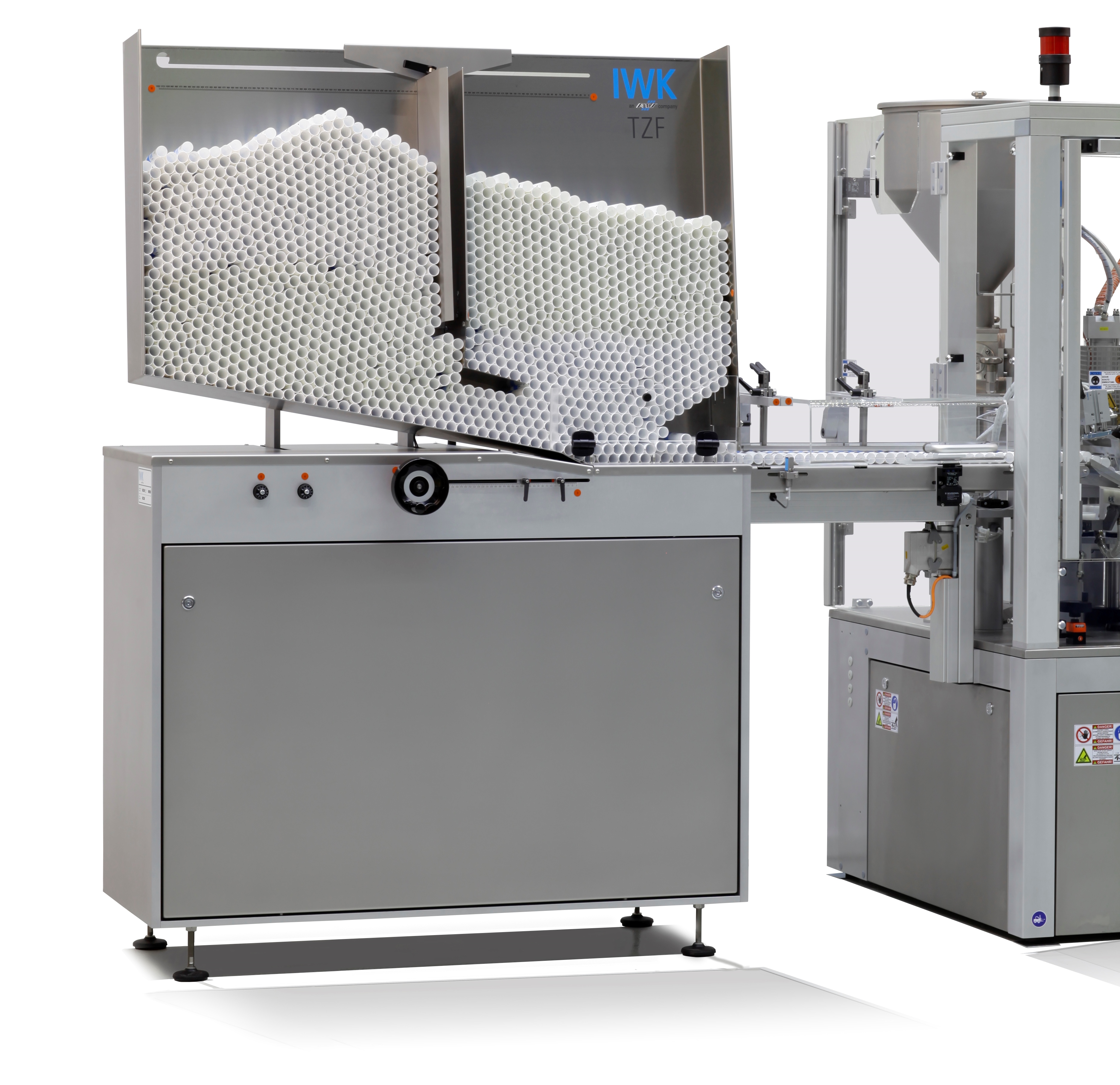 Semi-automatic tube feeding system TZF (up to 220 tubes/min.) - Tube feeding system